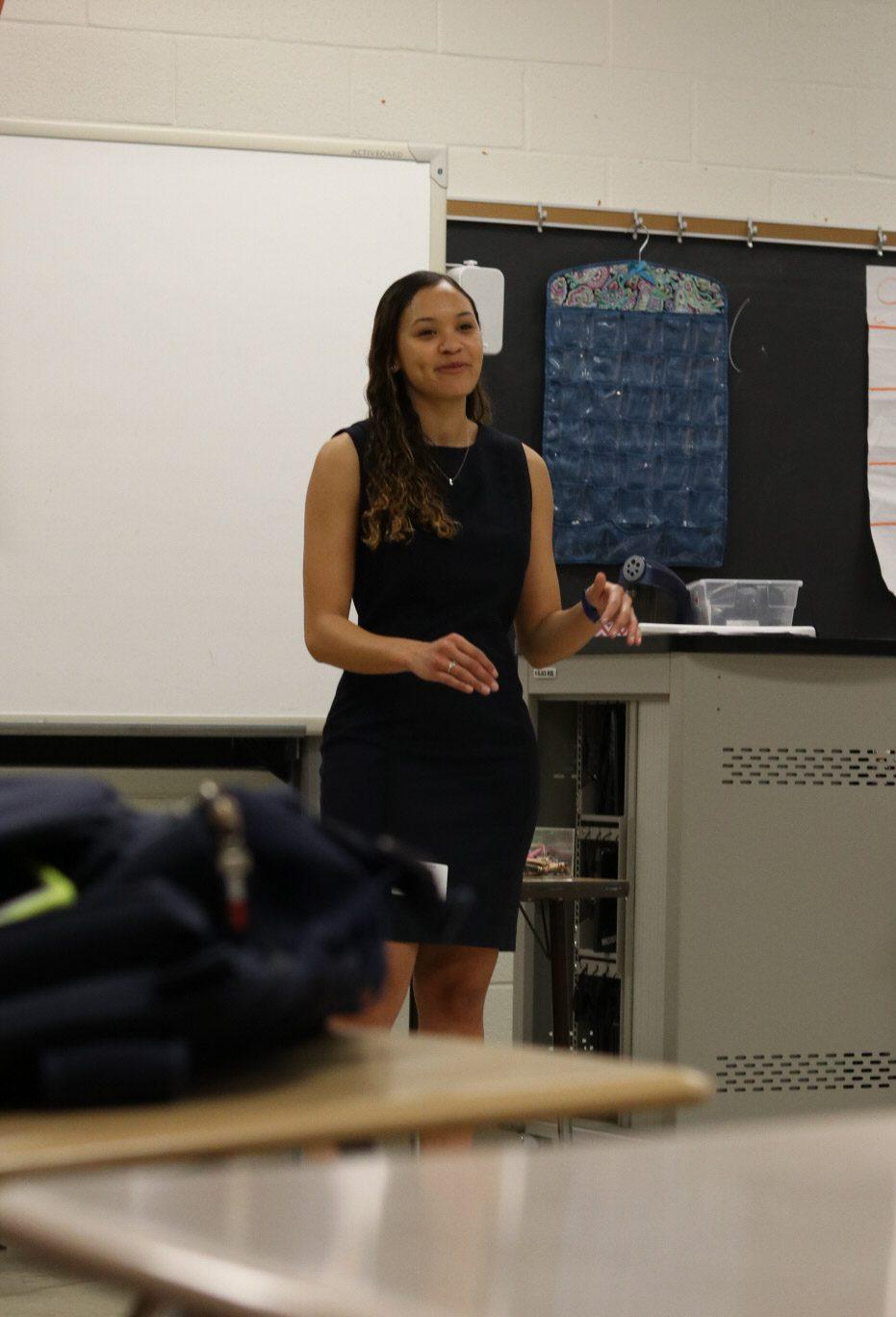 Jasmine Williams, founder of the alumni network, speaking with a freshman English class on Career Day.