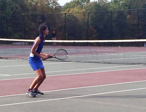 Freshman Bianca Johnson waits on a serve