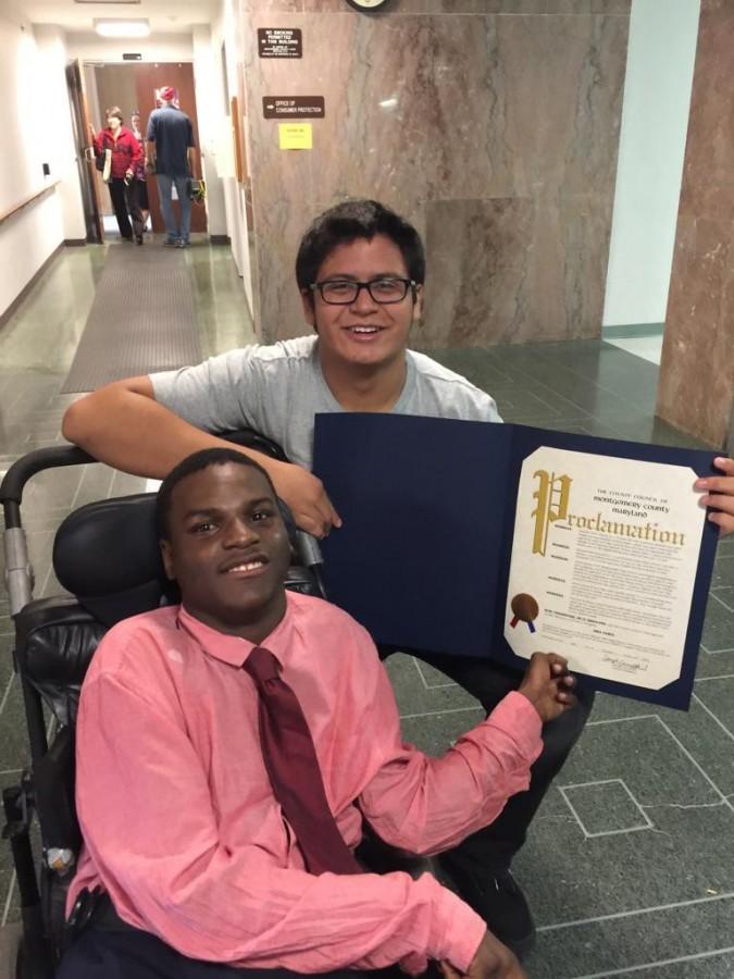 Junior Brandon Rodriguez poses with senior Ibra Samia after receiving the County Council Proclamation