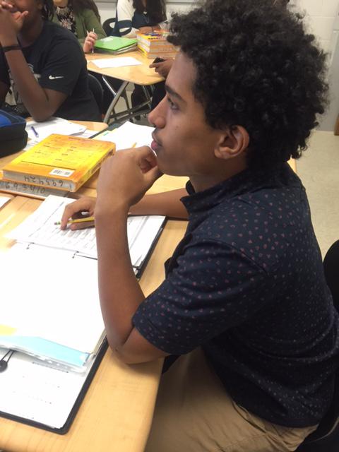 Sophomore Yishaq Woldesenebet pays attention in his health class to keep his grades up.  Maintaining his GPA while pursuing his musical career is a big goal for Woldesenebet.