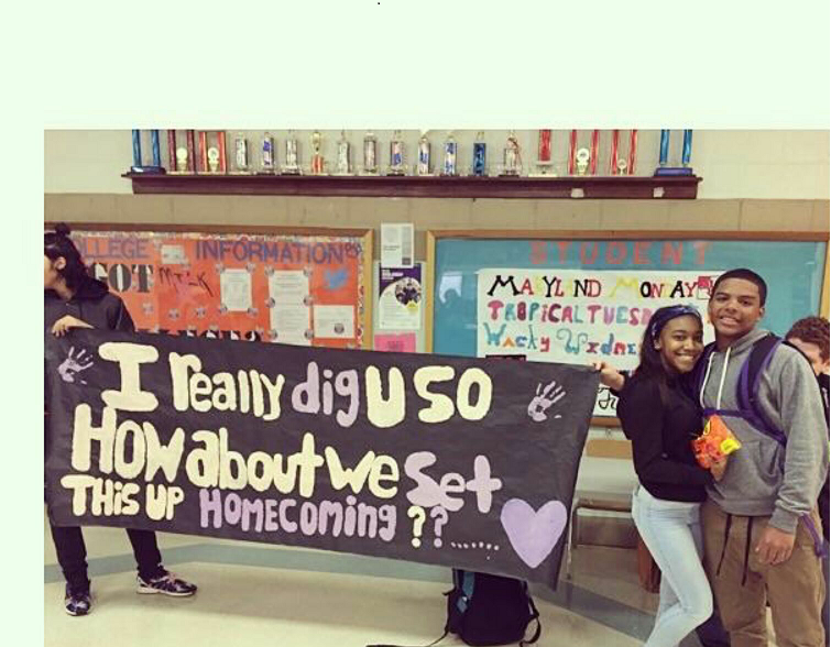 Sophomore+Camille+Allie+receiving+an+epic+homecoming+proposal+from+her+boyfriend%2C+sophomore+Michael+Smith.
