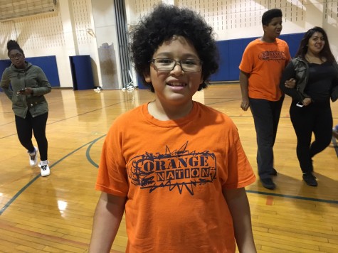 Freshman Victor Quintanilla wears his Orange Nation shirt in PE class