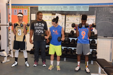 Alumni Joe Hooks checks out the new equipment that his GoFundMe page was able to purchase
