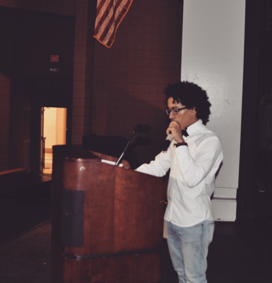 Sophomore Yishaq Woldesenbet presents a speech at the YEE assembly.