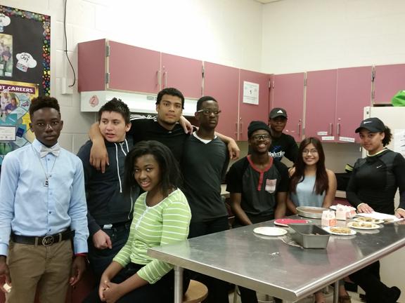 LFI students and some of culinary arts teacher Lisa  Gilberts first period class join in for a group photo. Culinary arts teacher Lisa Gilbert 