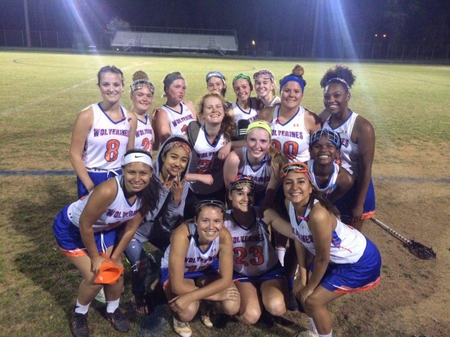 Girls varsity lacrosse poses after defeating the Einstein Titans 16-3 on April 25.