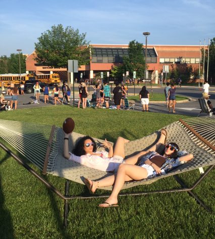 Seniors prank teachers with staff parking lot beach party