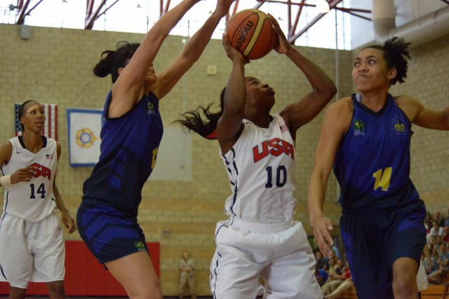Girls basketball coach Donita Adams (number 10) playing professional basketball in the Conseil International du Sport Militaire in Italy, before returning to coach the Lady Rines