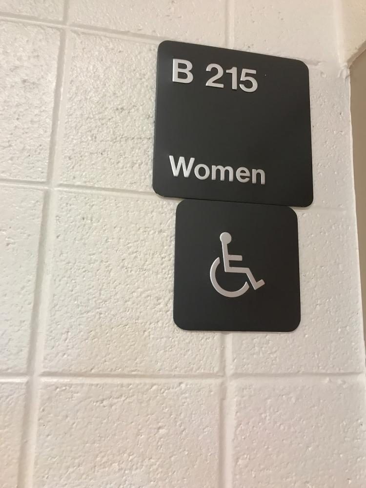 Girls bathroom sign at Watkins Mill High School.