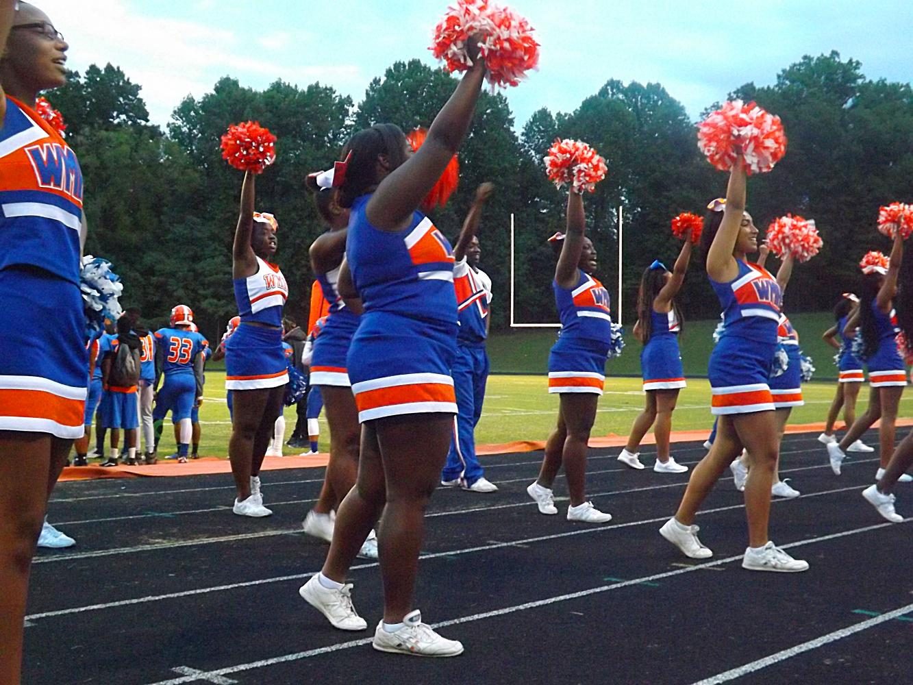 Cheerleaders on the sidelines at the football opener on September 1.