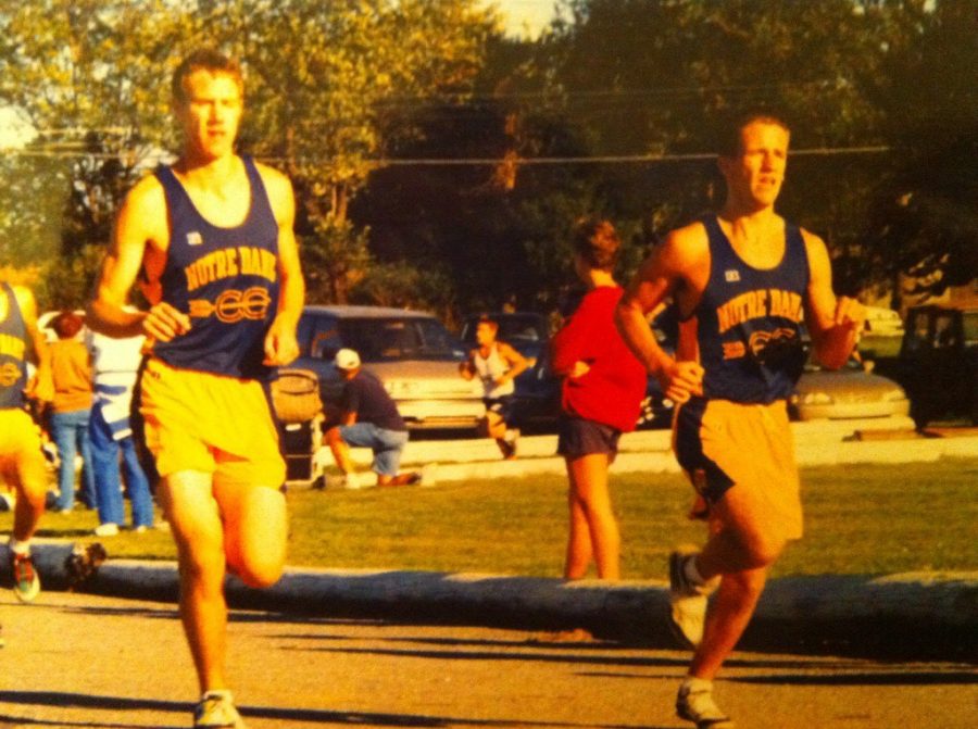 Engineering teacher Ed Graf (left) running track when he was in high school