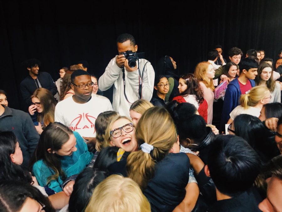Marjory Stoneman Douglas High School survivor Delaney Tarr gives MCPS students a group hug after the event 
