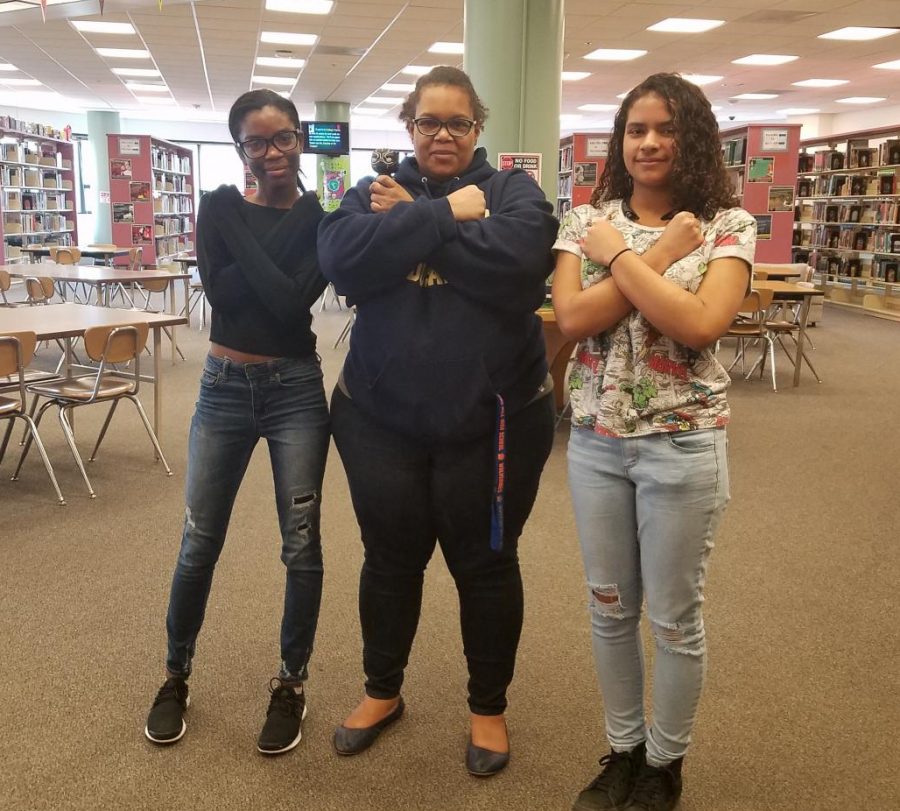 Juniors Nadaja Burnett and Charisse Warfield with English resource teacher Wendy Farmer