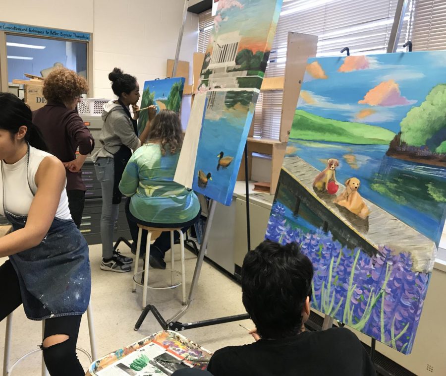 Students work on their artwork for the Youth Art for Healing program