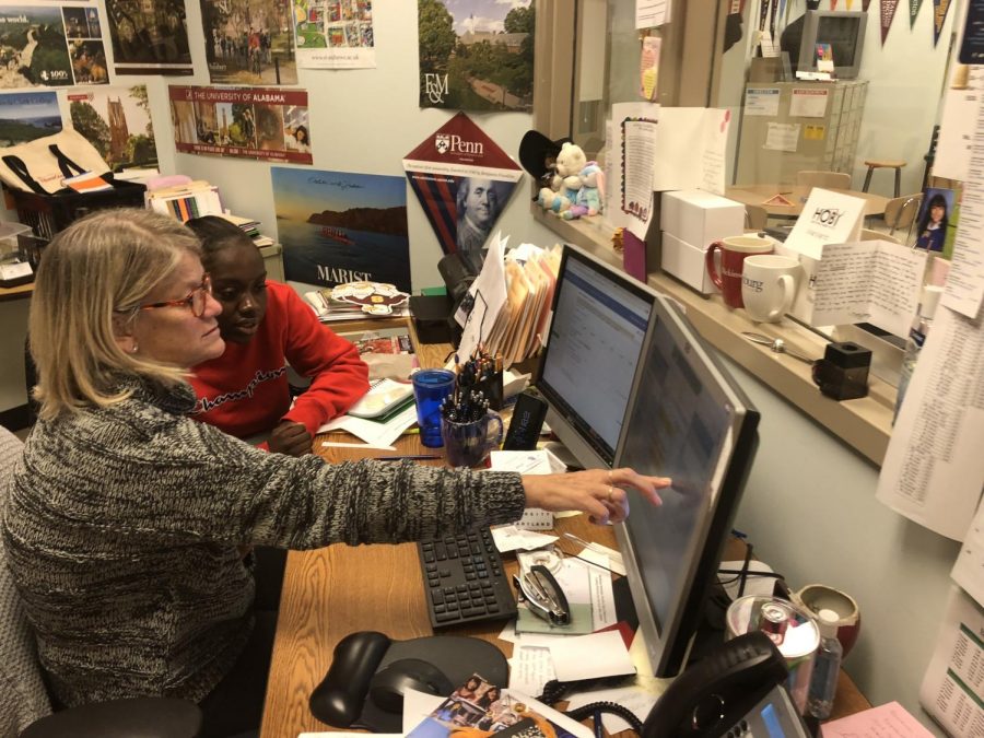 Senior Janice working with Career/Center Information Coordinator Kate Heald on the college application process.