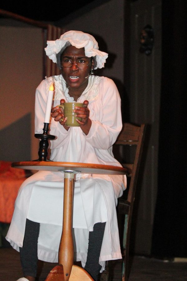 Bahumbug! Junior Taylor Leonard as Elizabeth Scrooge in dress rehearsal for A Christmas Carol