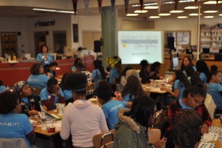 Students are doing an activity about choosing the right career path during the Dream It, Be It event at Watkins Mill High School.