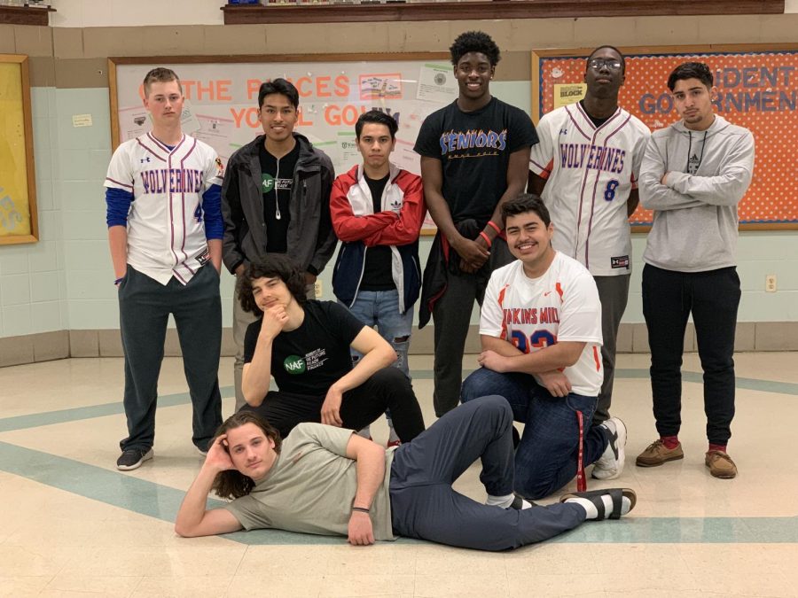 Male contestants for Mr. Watkins Mill pose for a group picture. 