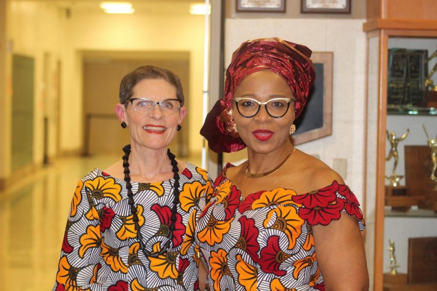 Principal Carol Goddard and math teacher Taiwo Okusaga wearing matching prints as the Watkins Mill ASA.