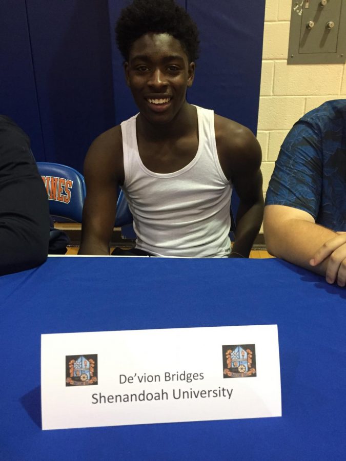Senior Devion Bridges celebrates his future playing football at Shenandoah University.