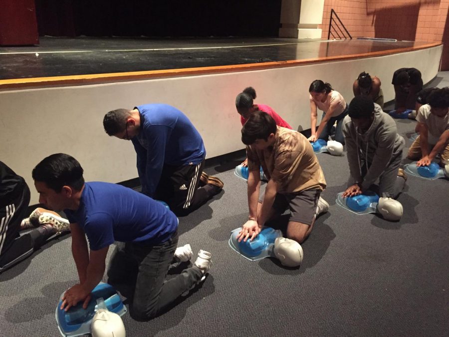 Teacher Laura Davis Vaughan raises funds to get her IB Sports and Health Medicine class CPR certified.

(back row left to right) - senior Jose Benitez, junior Taylor Leonard, junior Gisell Maravi, junior Nia Manor

(front row left to right) - senior Nilson Ortiz Castillo, junior Rafael Fernandez DeLeon, junior Amadu Bah, junior Dylan Castillo