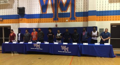 Senior athletes commit to colleges to continue sports careers