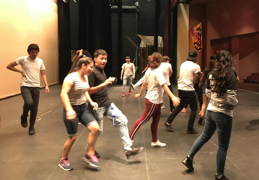 ESOL Theatre students learn movement exercises from members of the Olney Theatre Center 