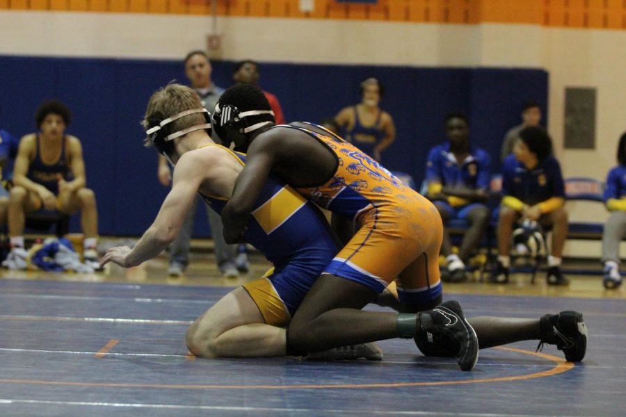 The+Watkins+Mill+High+School+Wolverines+defeated+the+Gaithersburg+High+School+Trojans+in+a+wrestling+match+on+January+28.