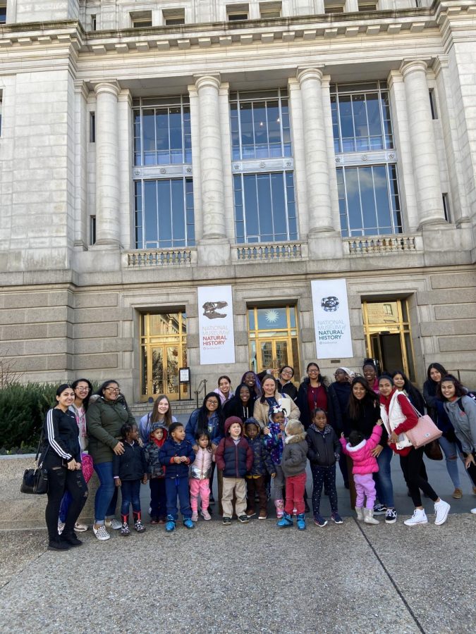 Child Development preschoolers, high school students and teacher Melissa Cloyd outside the Smithsonian National Museum of Natural History. 