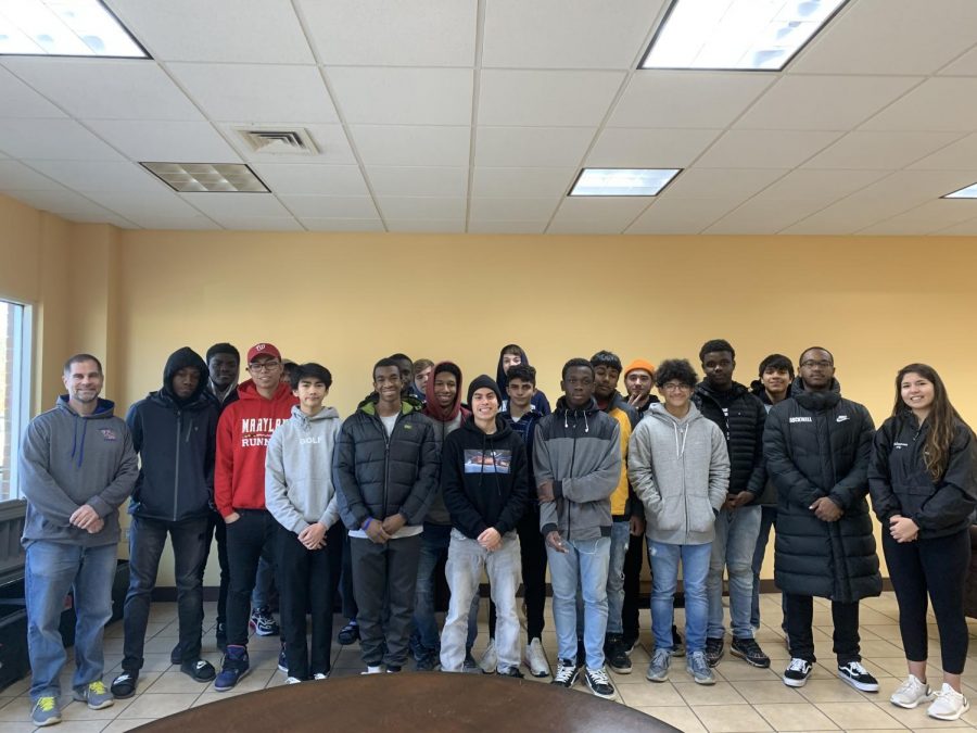 Men of ELITES posing for a picture after taking a visit to A Wider Circle in Silver Spring MD