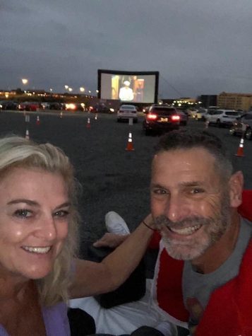 Media Specialist Anamaria Mitton enjoys a drive-in movie with her husband Bob Mitton at Rockville's DC Party Box.