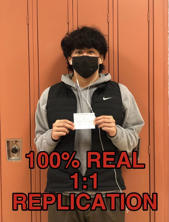 Michael Quintanilla poses with a totally real vaccination card, absolutely real, with nothing suspicious about it at all.