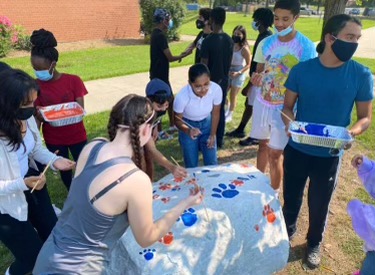 Seniors painting the rock and preparing for their final year of high school.