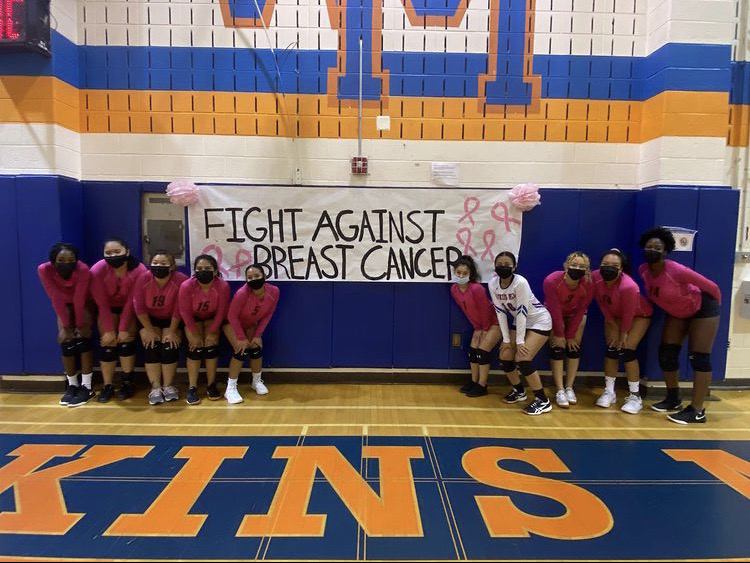Varsity Volleyball during their Dig Pink game.
