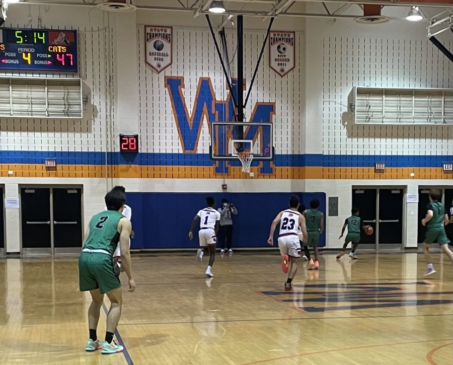 Varsity Boys Basketball teams first game of the season against Walter Johnson High School Wildcats