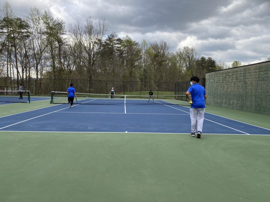 Boys tennis warms up for their match.