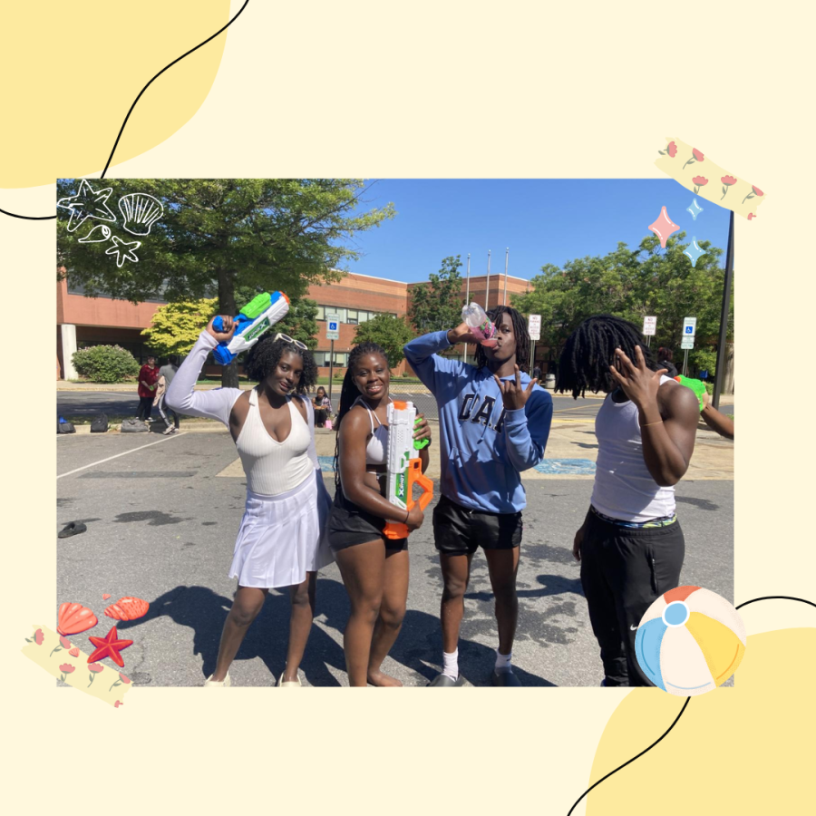 Seniors pose with friends and water guns during the senior barbecue with friends.