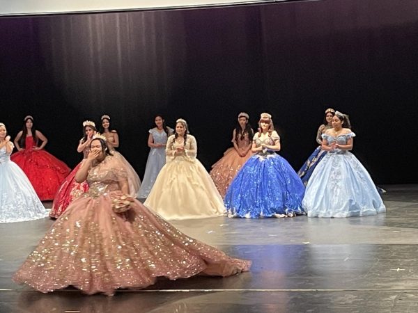 Students show off their Quinceanera gowns at the Hispanic Heritage Festival. 